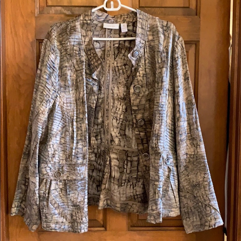 Tan, brown, and cream colored light jacket